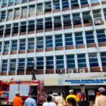 Fachada da Secretaria da Fazenda de Aracaju com viaturas do Corpo de Bombeiros.