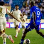 Jogadores do Confiança em campo na Arena Batistão durante as quartas de final da Copa do Nordeste 2026.