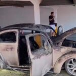Veículo atingido por incêndio em garagem de condomínio residencial no bairro Grageru.